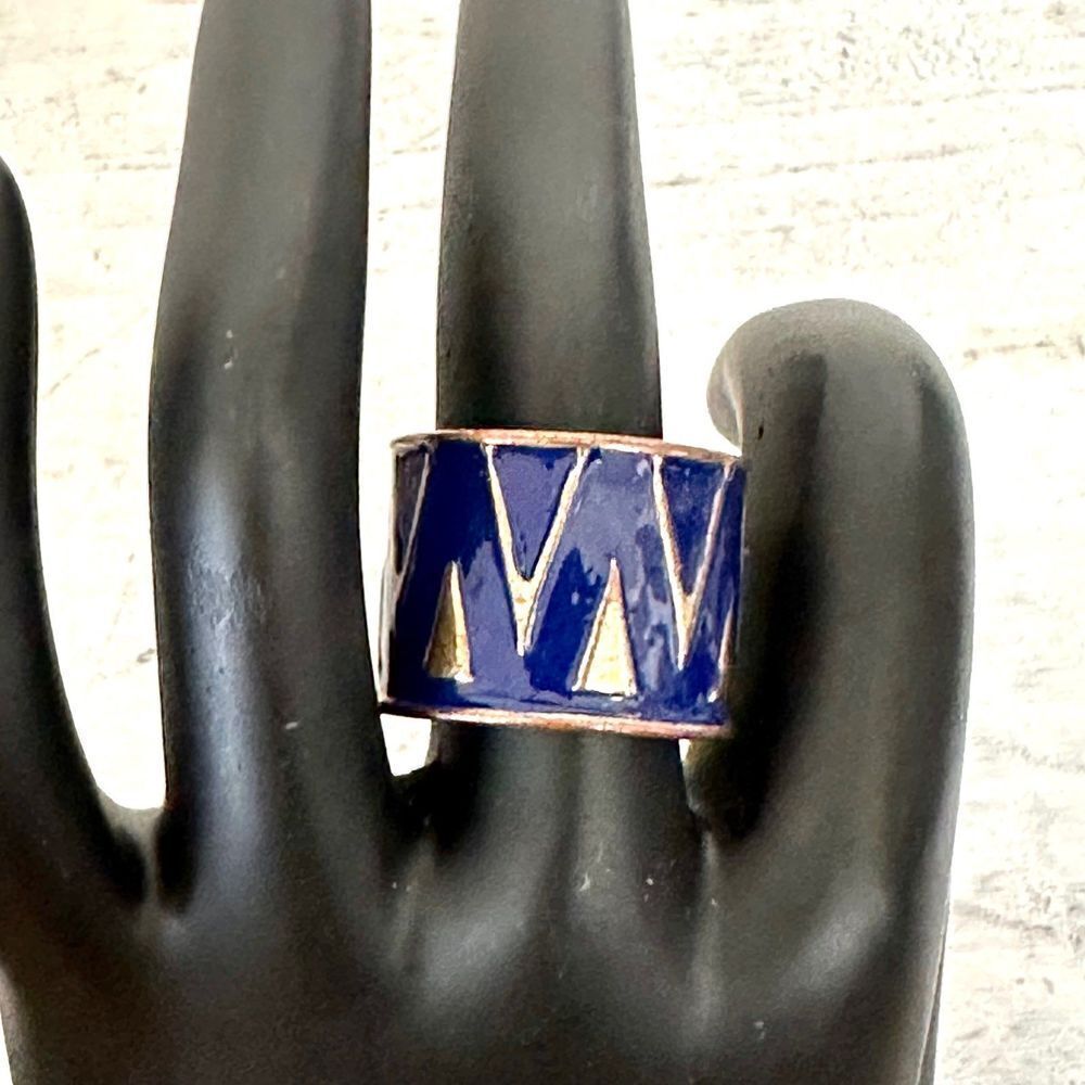 Blue and gold tone wide ring